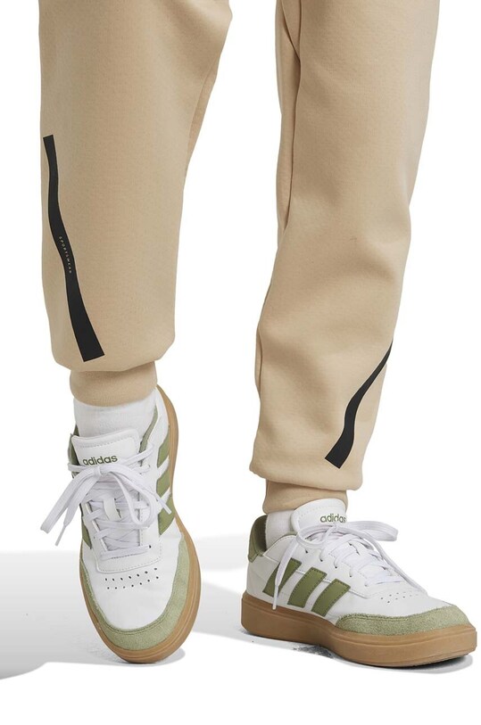 Chłopiec adidas spodnie dresowe dziecięce J Z.N.E. PT JF2492 brązowy