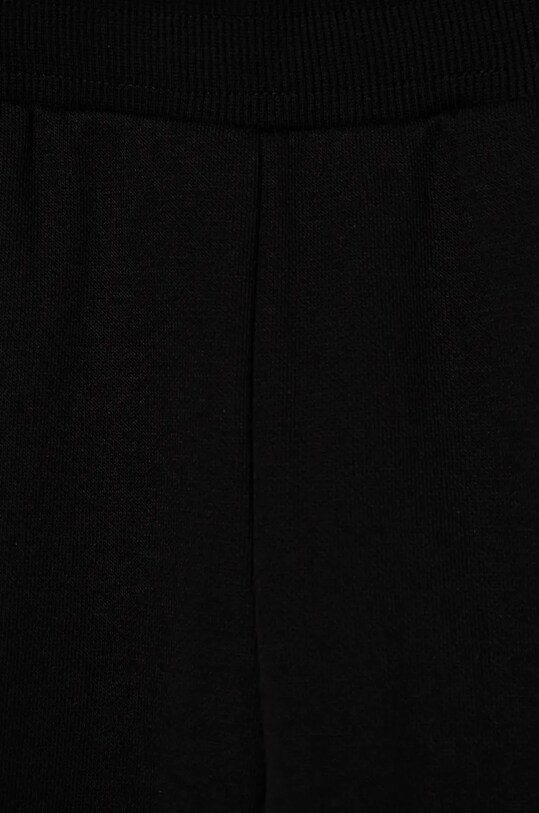 Dječaci Dječji donji dio trenirke Puma ESS+ TROPICAT Sweatpants 681829 crna