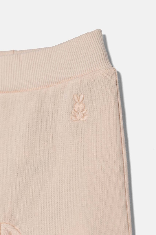 Chłopiec United Colors of Benetton spodnie dresowe bawełniane niemowlęce 3J70AF01R.W.Seasonal różowy