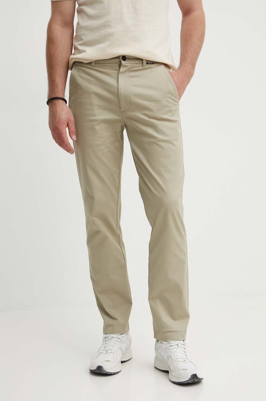 Calvin Klein spodnie z elastanem zielony K10K113692