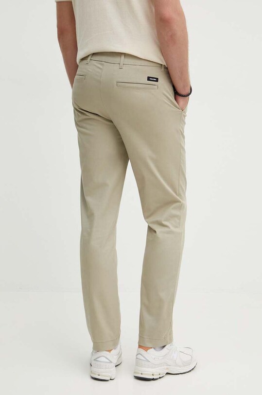 Odzież Calvin Klein spodnie K10K113692 zielony