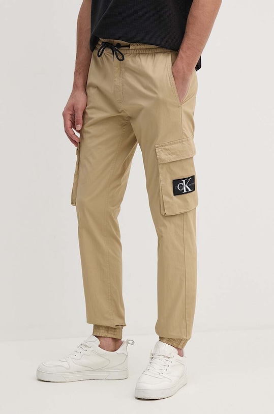 Calvin Klein Jeans spodnie z elastanem beżowy J30J325900