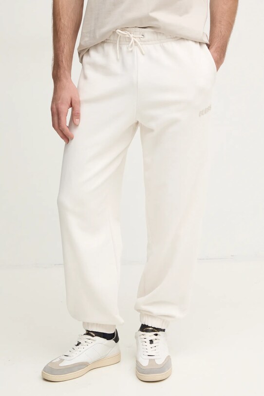 Guess spodnie dresowe EMIS dzianina beżowy Z4YB00.KAIJ1