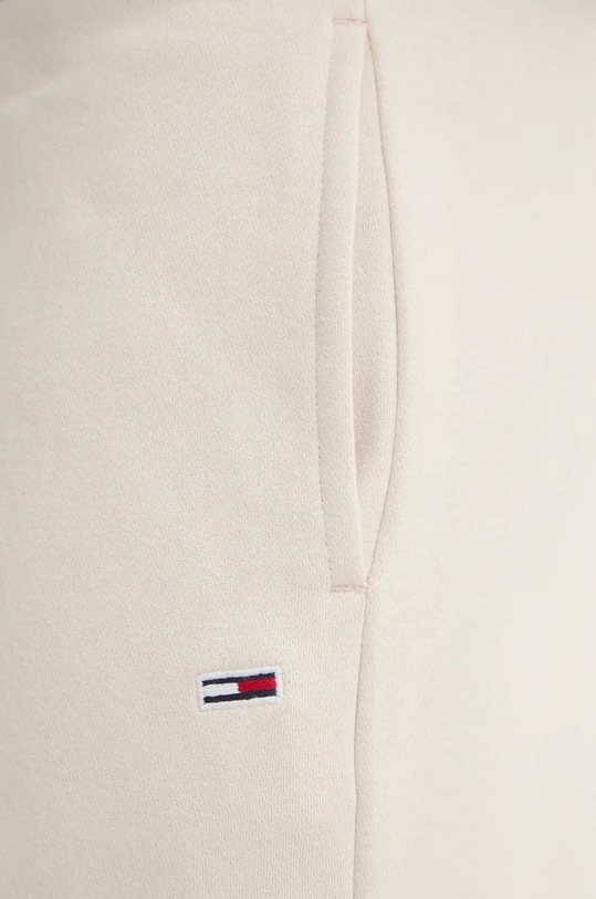 Tommy Jeans spodnie dresowe beżowy DM0DM20473