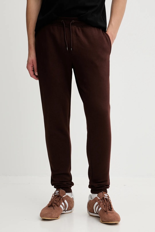 Tommy Jeans spodnie dresowe dzianina brązowy DM0DM20473