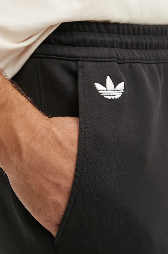 Tepláky adidas Originals Neuclassics Pant černá IW0973