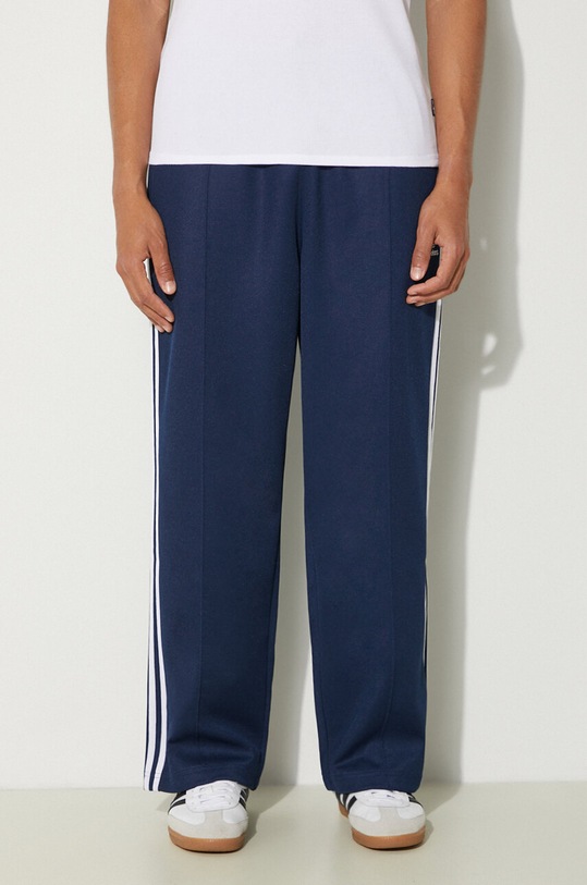 Tepláky adidas Originals Adicolor Baggy Fit Firebird Pant pletenina tmavomodrá IZ2466