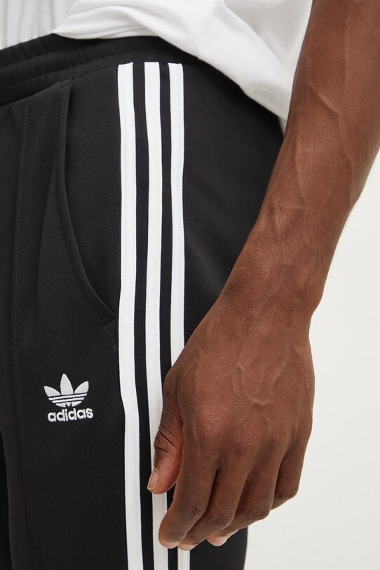 Tepláky adidas Originals Adicolor 70s Track Pant čierna IZ4807