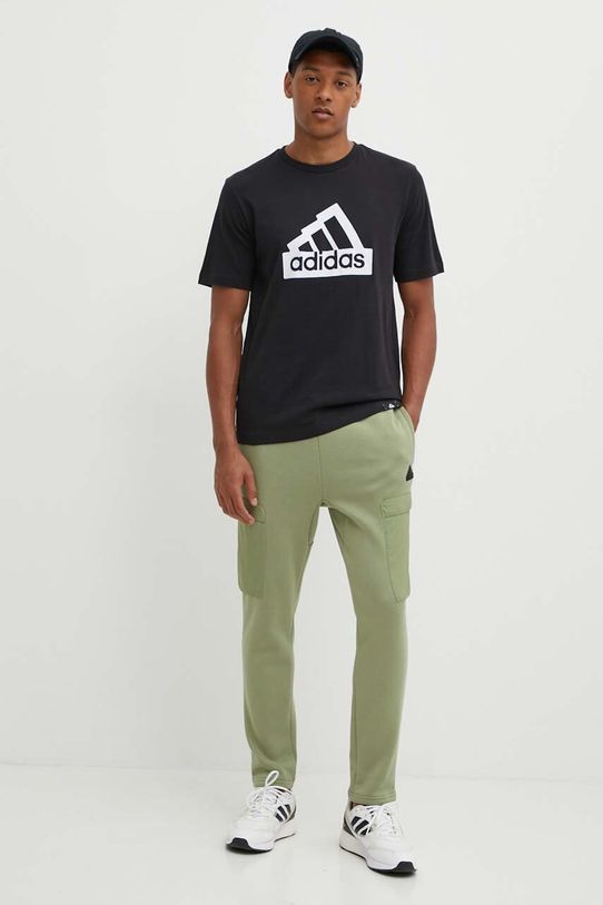 Donji dio trenirke adidas City Escape IV7419 zelena AW24