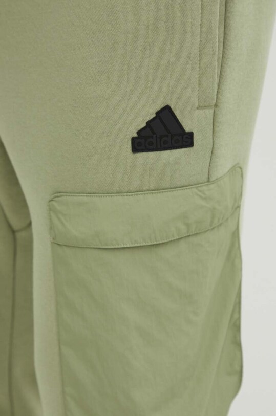 Спортивні штани adidas City Escape зелений IV7419