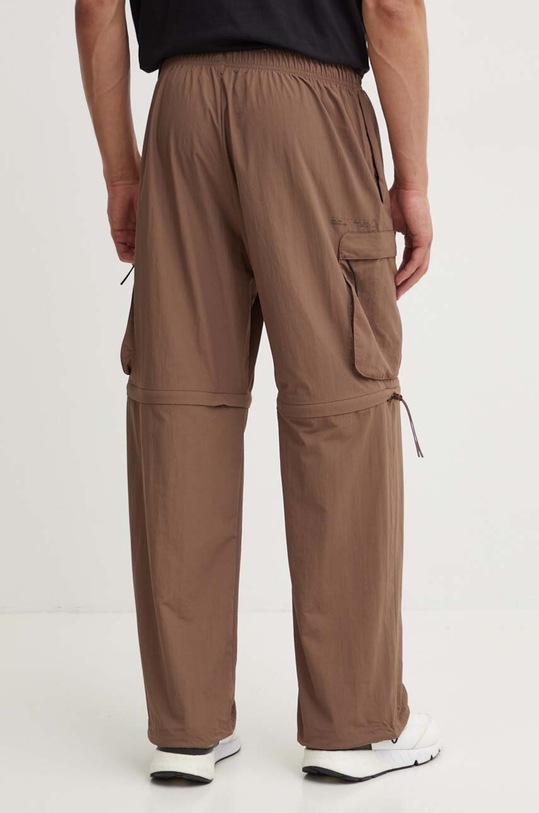 Одяг Спортивні штани adidas City Escape IY1504 коричневий