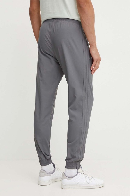 Oblečení Kalhoty adidas Originals IZ2109 šedá