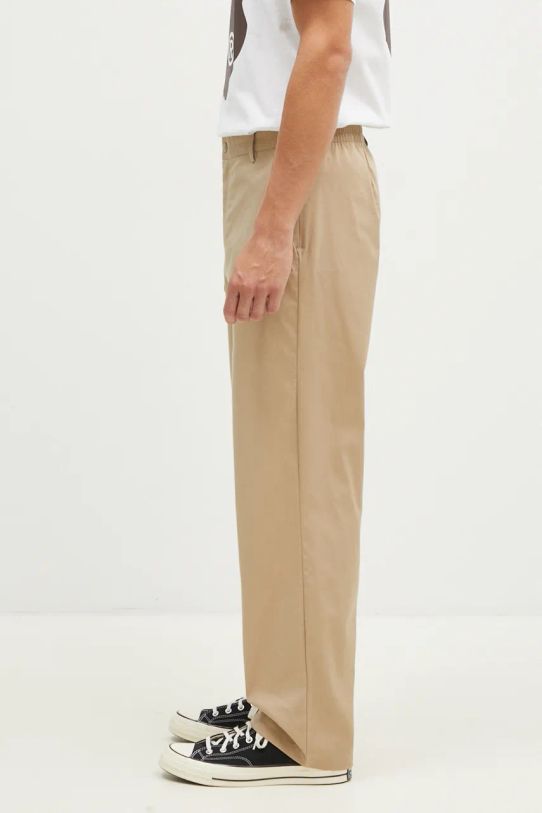 Kalhoty New Balance Athletics Standard Pant 30" MP43560SOT béžová SS25