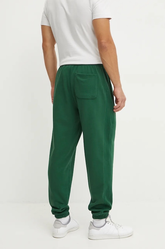 Odzież New Balance spodnie dresowe bawełniane MP41508NWG zielony