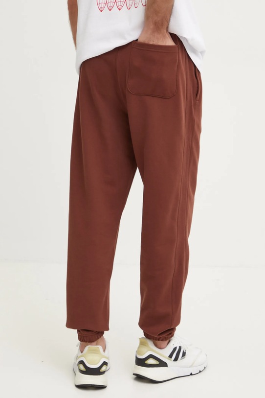 Oblečení Bavlněné tepláky New Balance MP41508ROK hnědá