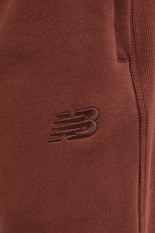 Bavlnené tepláky New Balance hnedá MP41508ROK