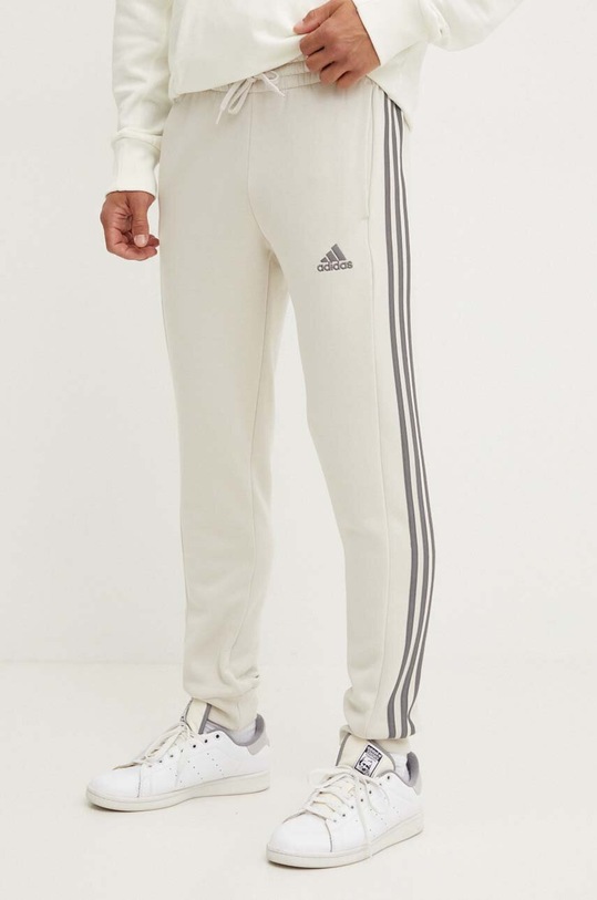 Tepláky adidas Essentials pletenina béžová JG5952