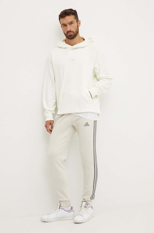 Tepláky adidas Essentials JG5952 béžová AW24