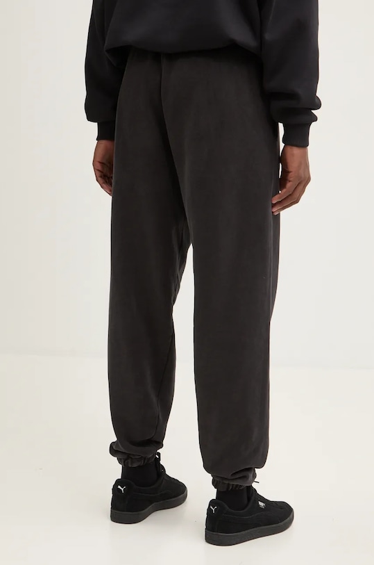 Bombažen spodnji del trenirke Karl Kani črna 60030052