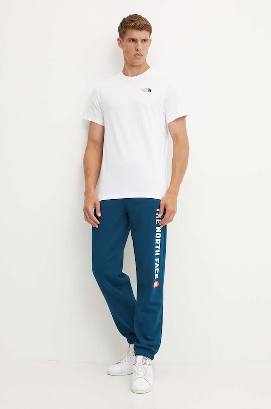 Tepláky The North Face Pant Varsity Graphic NF0A89DP1NO1 tyrkysová AW24