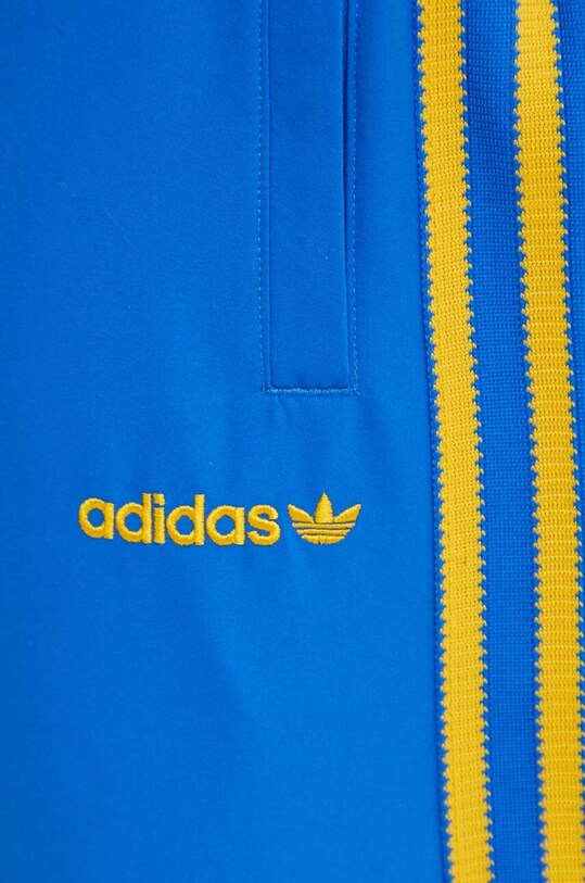 Спортивні штани adidas Originals IW3234 блакитний