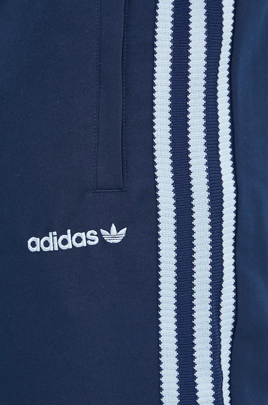 Tepláky adidas Originals tmavomodrá IX9625