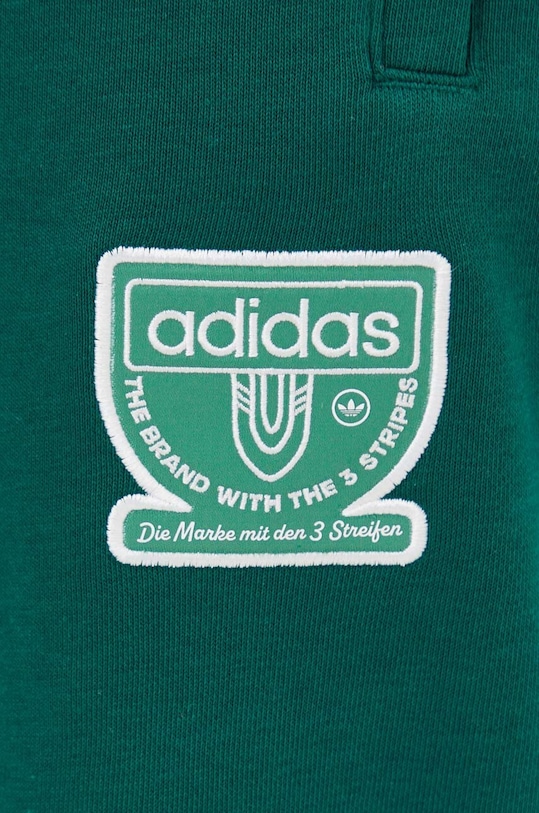 Tepláky adidas Originals zelená IX9632