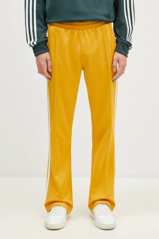 Tepláky adidas Originals 70S Track Pant nášivka žltá IX5223