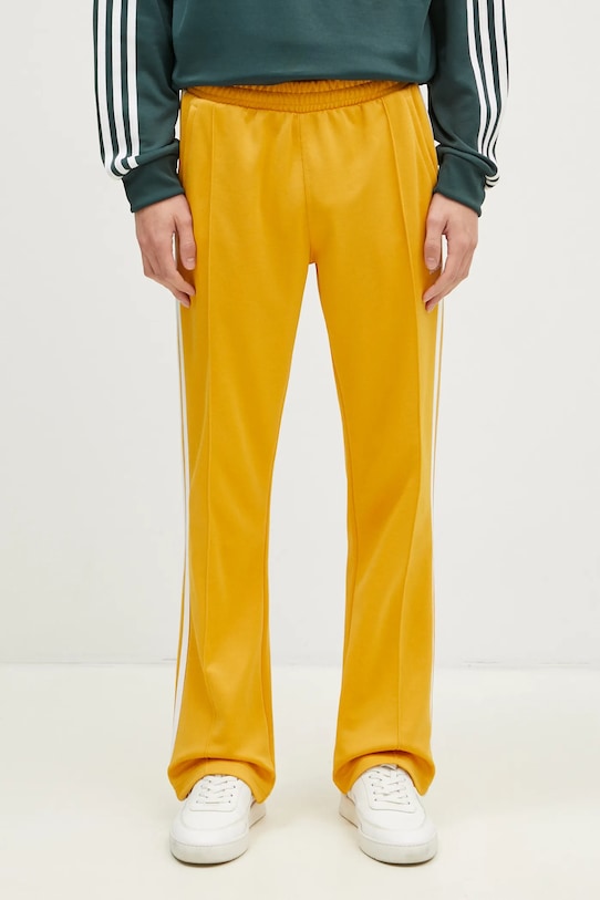 adidas Originals spodnie dresowe 70S Track Pant dzianina żółty IX5223
