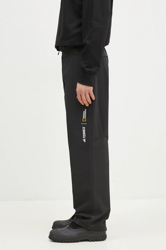 Donji dio trenirke adidas National Geographic Pant IX7923 crna AW24
