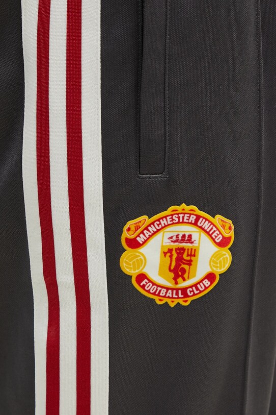 Παντελόνι φόρμας adidas Originals Manchester United Beckenbauer Track Pant γκρί IY0044