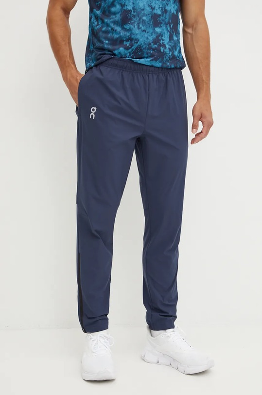 Běžecké kalhoty On Core látka námořnická modř 1MF10111573