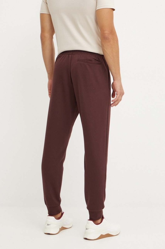 Odzież adidas spodnie dresowe Essentials IY9086 brązowy