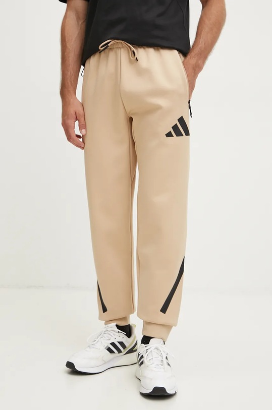 Tepláky adidas ZNE pletenina béžová JE7539