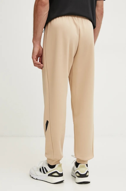 Oblečení Tepláky adidas ZNE JE7539 béžová