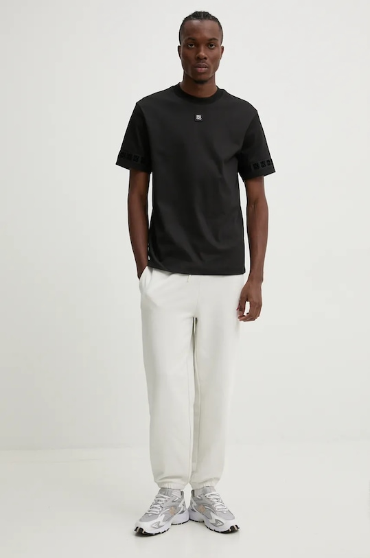 Бавовняні спортивні штани HUGO 50521082 бежевий AW24