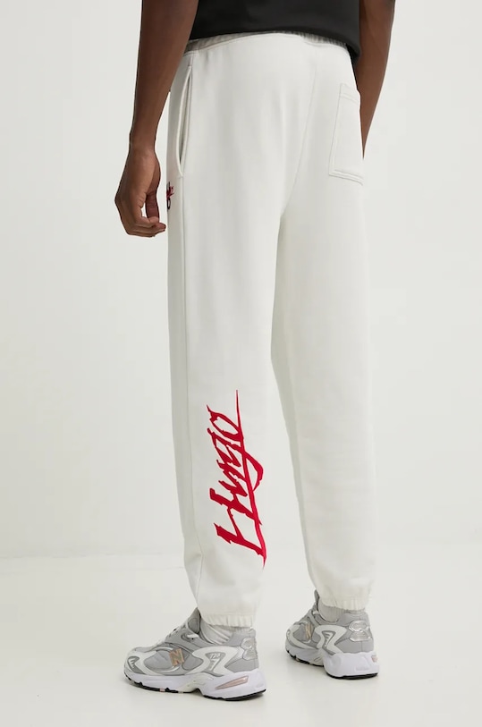 Одяг Бавовняні спортивні штани HUGO 50521082 бежевий