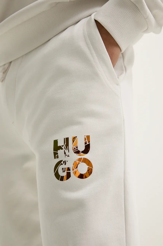 Хлопковые спортивные штаны HUGO бежевый 50522127