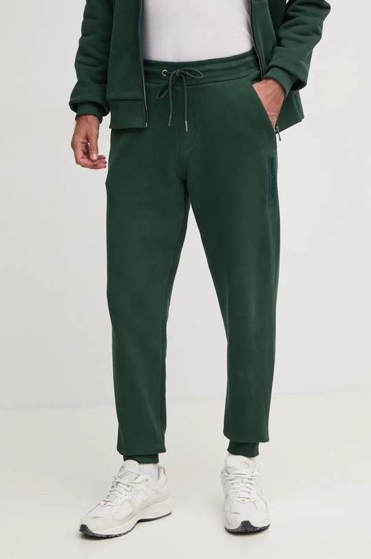 Calvin Klein spodnie dresowe bawełniane aplikacja zielony K10K113579