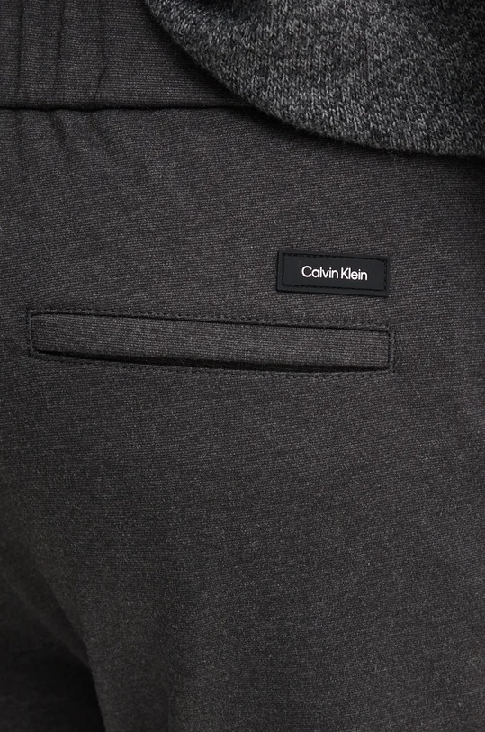 Kalhoty Calvin Klein šedá K10K113647