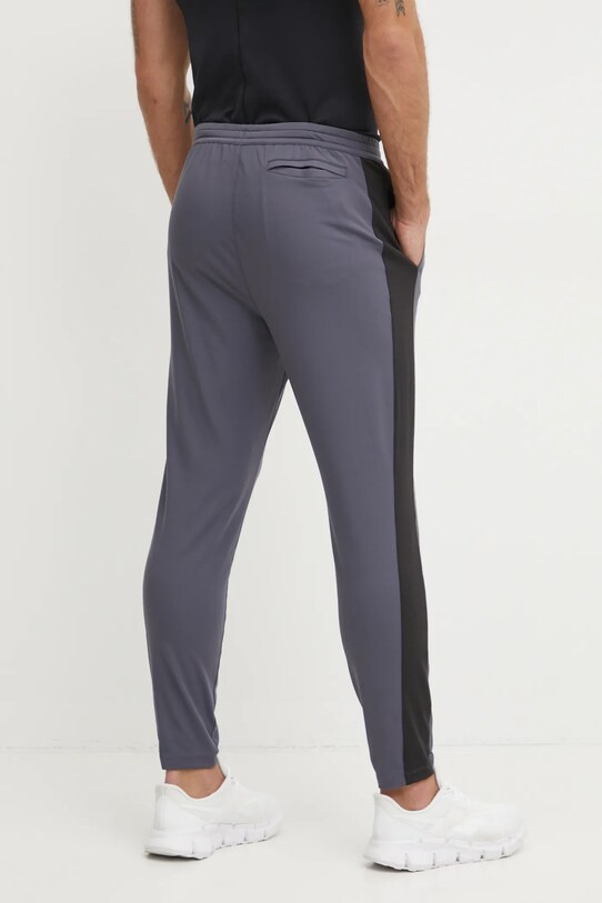 Oblečenie Tréningové nohavice Puma Cloudspun 525717 sivá