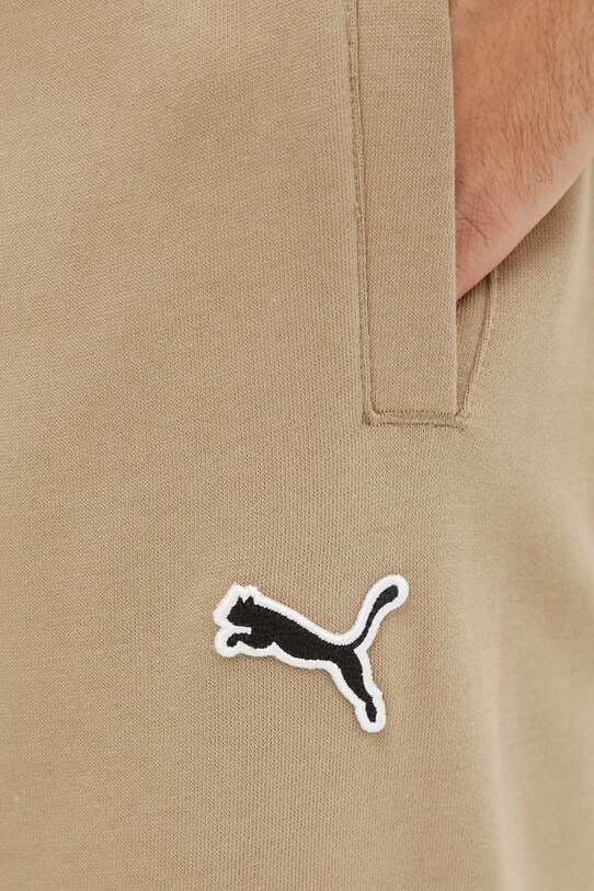 Puma spodnie dresowe bawełniane beżowy 676816