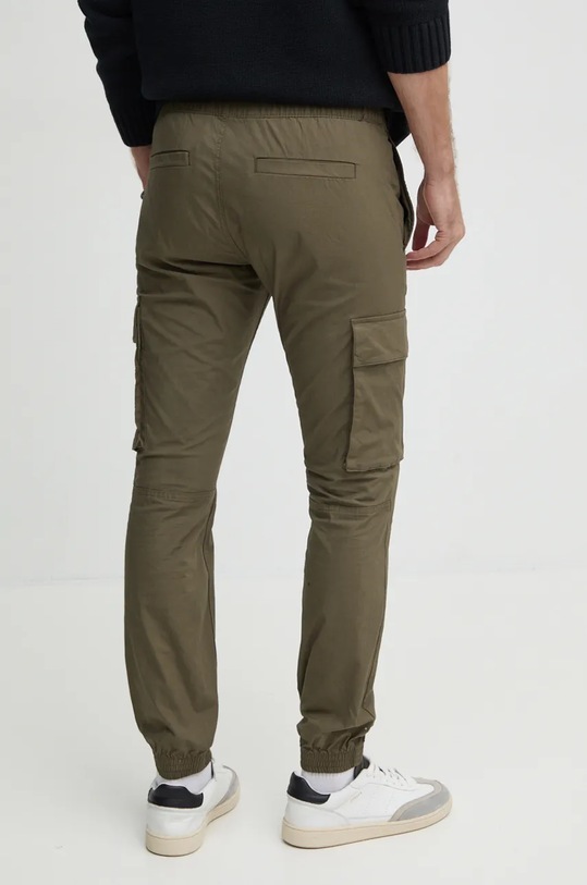 Oblečenie Nohavice Calvin Klein Jeans J30J326438 zelená