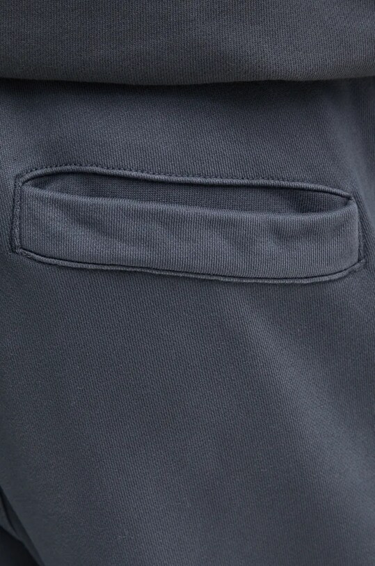 Pamučni donji dio trenirke Calvin Klein Jeans siva J30J326686