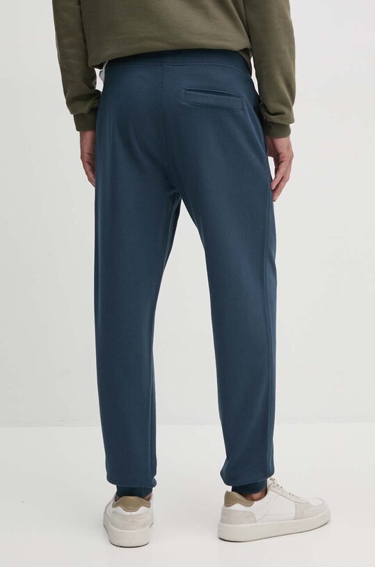 Одяг Бавовняні спортивні штани Calvin Klein Jeans J30J326886 темно-синій