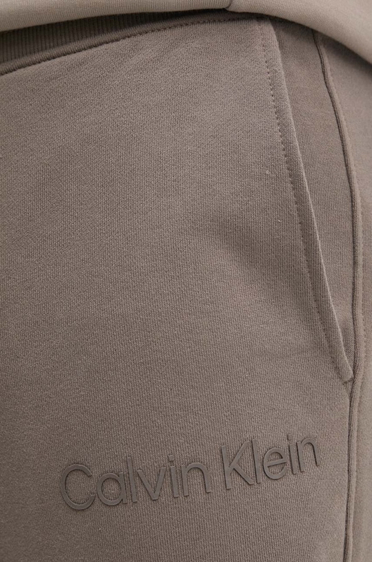 Calvin Klein Jeans spodnie dresowe bawełniane beżowy J30J326886