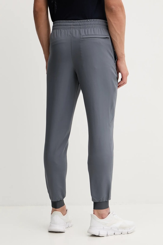 Odzież Under Armour spodnie treningowe Unstoppable 1388823 szary