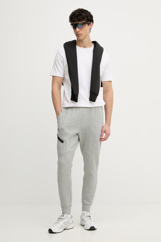 Under Armour spodnie dresowe męskie Unstoppable Fleece 1389353 szary SS26