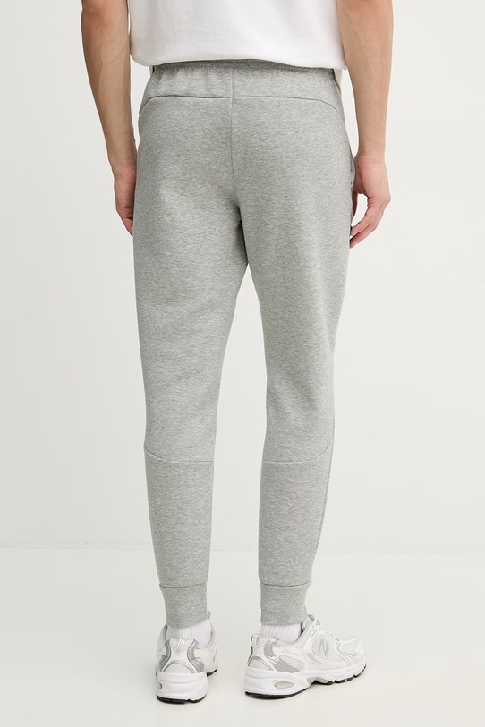 Odzież Under Armour spodnie dresowe męskie Unstoppable Fleece 1389353 szary