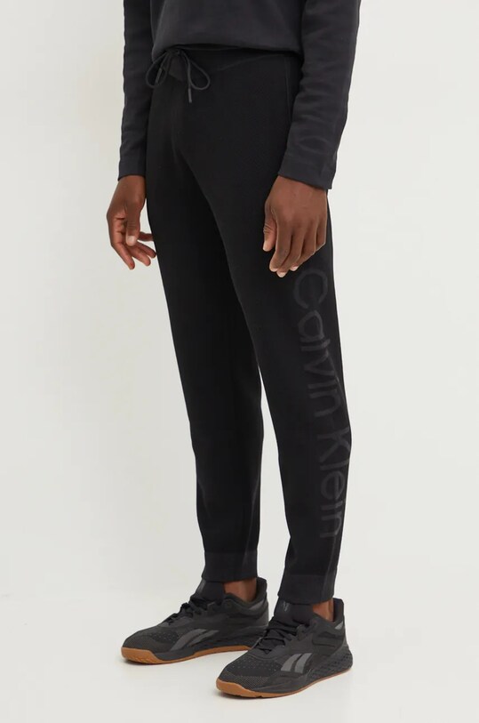 Calvin Klein Performance spodnie dresowe dzianina czarny 00GMF4P607